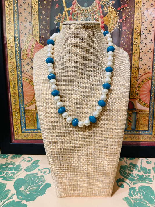 PEARL STRING WITH BLUE STONE